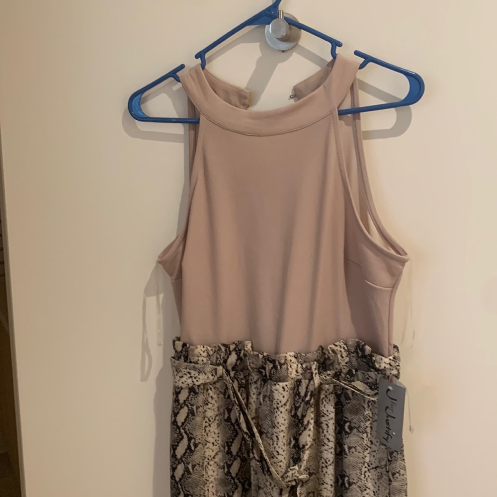 Never worn with tags snakeskin jumpsuit!